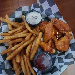 Flanagan's Famous wings &amp; fries.