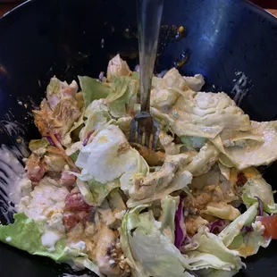 $12 salad with 3-4 small grilled tenders in it. Tossed but I had not taken a bite yet.