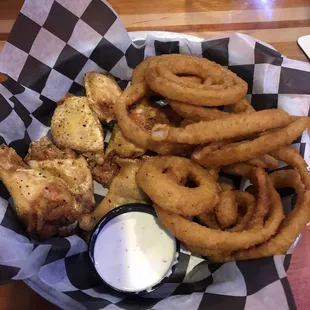 Lemon pepper wings and onion rings.