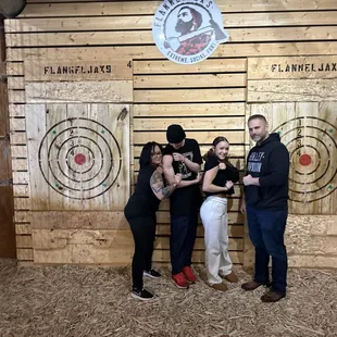 Flexing after we each hit a bullseye