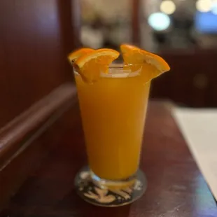 a glass of orange juice