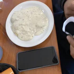 a plate of pancakes and gravy