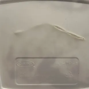 Melted styrofoam visible on bottom of container