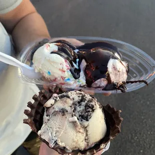 Peanut butter twist chocolate dipped waffle cone Birthday cake and Raspberry cheesecake with hot fudge