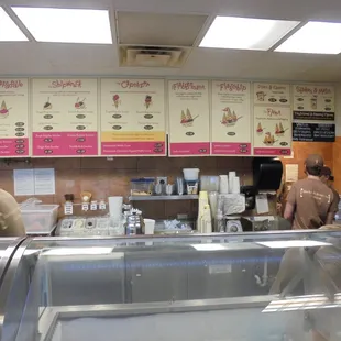 Menu board with size options.