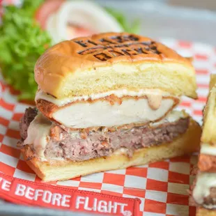 a sandwich with meat, cheese, and lettuce