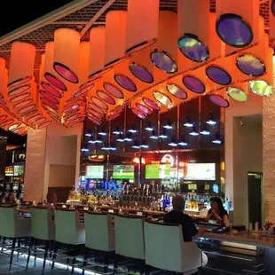 a brightly lit bar and lounge area