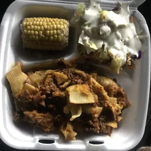 Stuffed shells, corn, and fresh salad