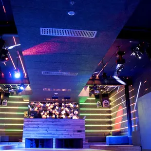 a brightly lit room with a lot of lights