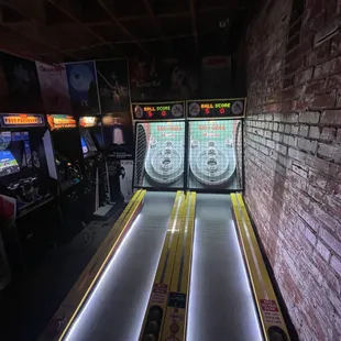 two bowling pins in a bowling alley