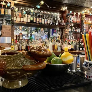 a bar with a variety of drinks