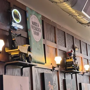 a display of construction equipment on a wall