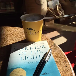 A book&apos;s best friend is a cup of coffee.