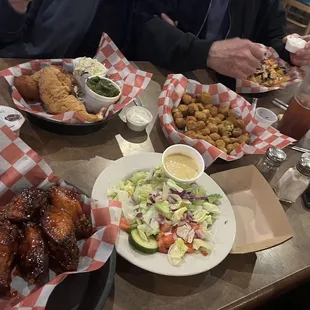 The best chicken wings ever, and my side salad, fried okra.