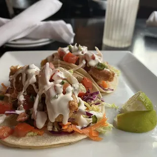 Baja Fish Tacos* 
beer battered rockfish tacos, coleslaw, pico de gallo, lime cream, corn tortillas