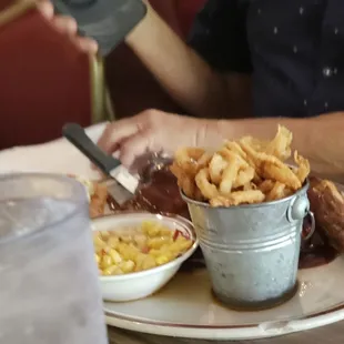 Sweet potatoes in  little metal serving pail