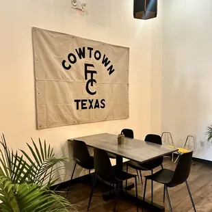 a table and chairs in a coffeehouse