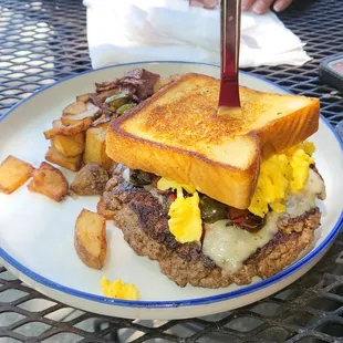 Patty melt with scrambled eggs