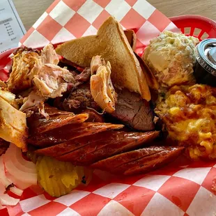 1/2 lb. Brisket, 1/4 lb. chicken, 1/4 lb. sausage, potato salad (small), brisket Mac &amp; cheese (small)