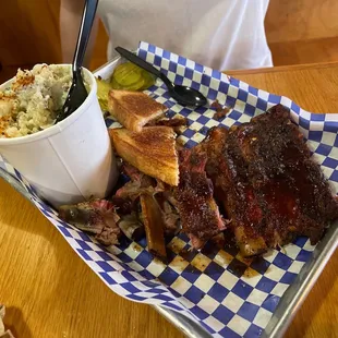 1/2 slab of ribs tater salad and Texas toast.