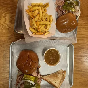 &quot;BBQ&quot; chicken sandwich, baked beans, Texas toast, and French fries.