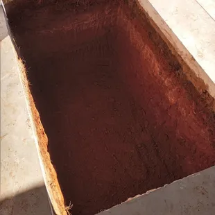 This is the completed hole under the garage floor.