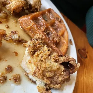 Chicken and waffles! Waffle was crunchy and tasted like a churro. Got the maple bacon butter.