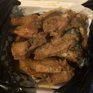 Replacement order fried but super soft and wet like baked chicken  Sauces just rolled off (garlic Parmesan and grizzly gold)