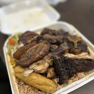 Oxtails and jerk chicken.