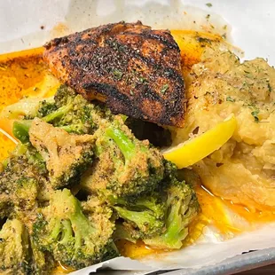 Salmon Filet, Broccoli and mashed potatoes in butter sauce
