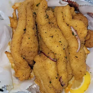 Catfish filets(4)  with hush puppies, fries and jalapeño slaw