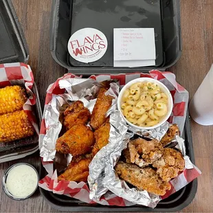 10pc Bone-in Combo: ooowee sweet &amp; sticky and goodness garlic parmesan (subbed fries for white cheddar mac) w/side of cajun corn.