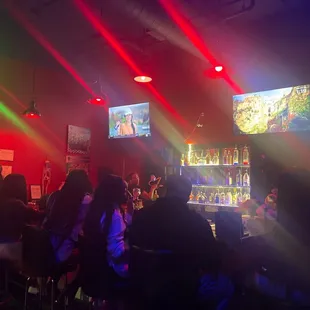 people sitting at a bar