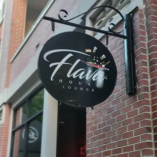 a sign for flava lounge