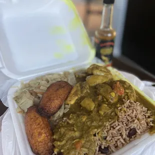 Curry Chicken Rice and Pea cabbage and Fried Plantains