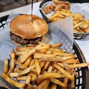 Lamb burger and fries and  chicken fingers and fries