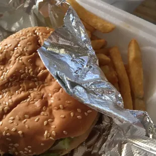 Cheeseburger $5.99 (add fries $1.69). About the size of a whopper. It's not special, but the price is right and it was tasty.