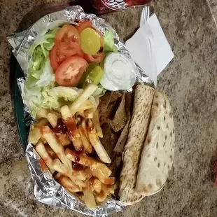 Got the gyro platter. Making my own delicious sandwich.