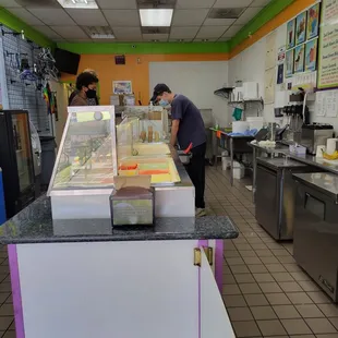 After entering the business, looking down where the ice creams are being scooped
