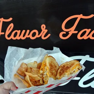 The trinity of all things great and wonderful: crab mac n cheese grilled cheese sandwich.