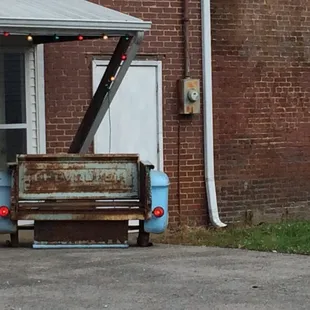 Antique store across the road had an tailgate from an old truck outside.