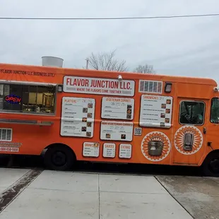 a food truck parked on the side of the road