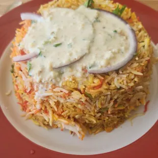 Chicken Biryani with sauce.