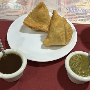 Veggie Samosa - thankfully not a grease bomb - nice spicy kick, stuffed with potatoes and green peas. Mint chutney on top = yum