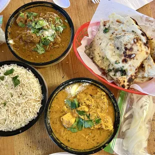 Chicken Curry, Lamb Curry, Plain Rice and Garlic NaanGarlic were our choices!