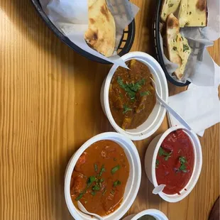 Butter chicken, chicken curry, chicken tikka masala and palak paneer. Side of butter and garlic naan