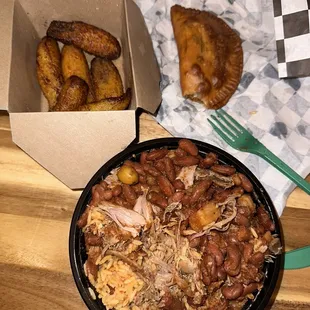 Slow Roasted Pork/Pernil, Rice and Pigeon Peas, Red Beans in Sauce/Habichuelas guisadas, Beef and Cheese empanada