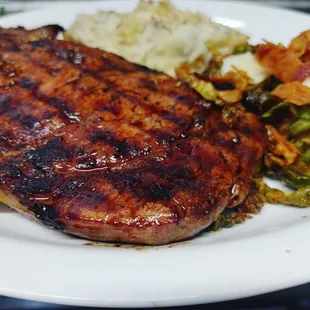 BIG Ribeye Served with Rosemary Mashed Potatoes or Fries, and our Veggie Side of Choice MP