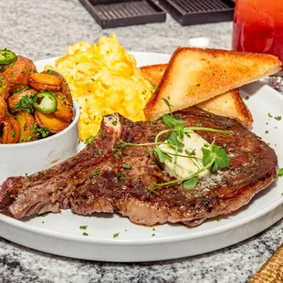 steak, potatoes, and vegetables