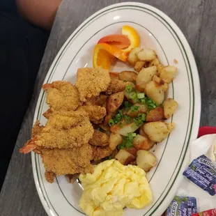Catfish and Shrimp combo with Country Potatoes and scrambled eggs